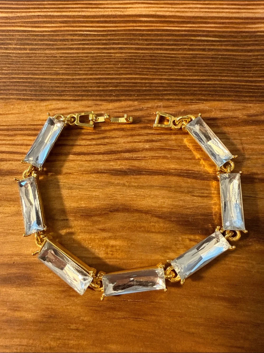 Gold tone with clear Tennis bracelet wiith baguette-cut stones
